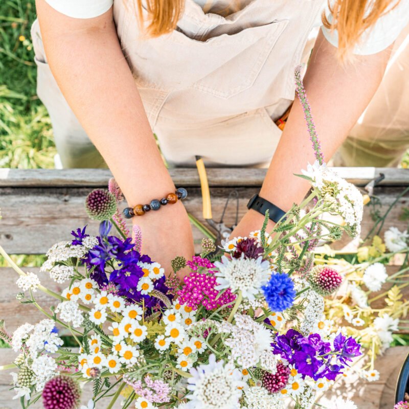 Personal branding shot of a lady arranging flowers at Chalk Farm Flowers, Findon, West Sussex.